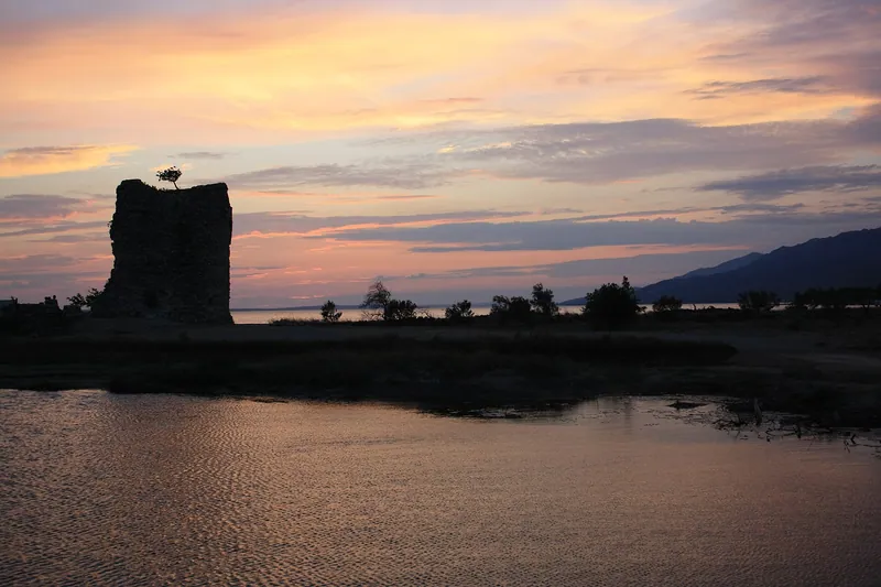 Večka kula, the old tower on the shore at Starigrad Paklenica, at sunset