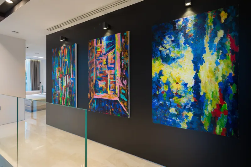 Paintings on the upper landing