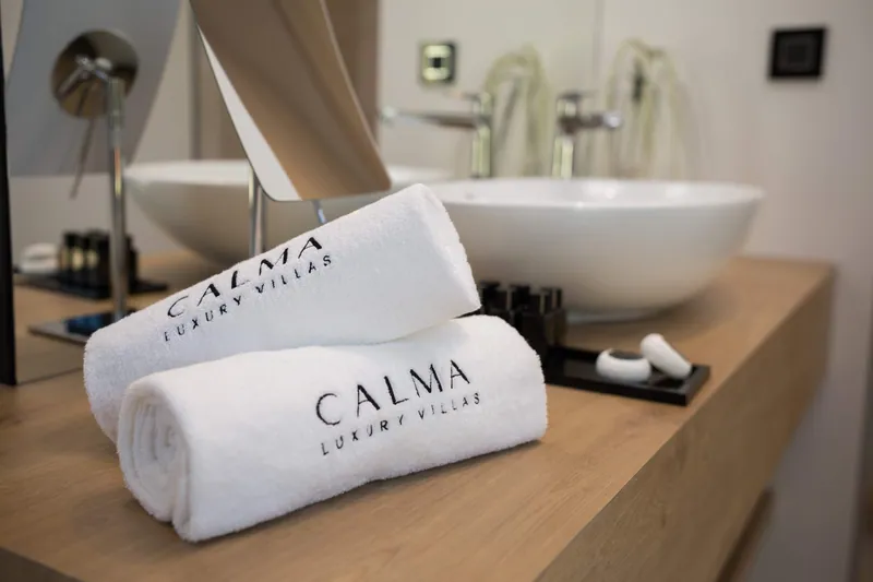 Calma towels on the oak vanity